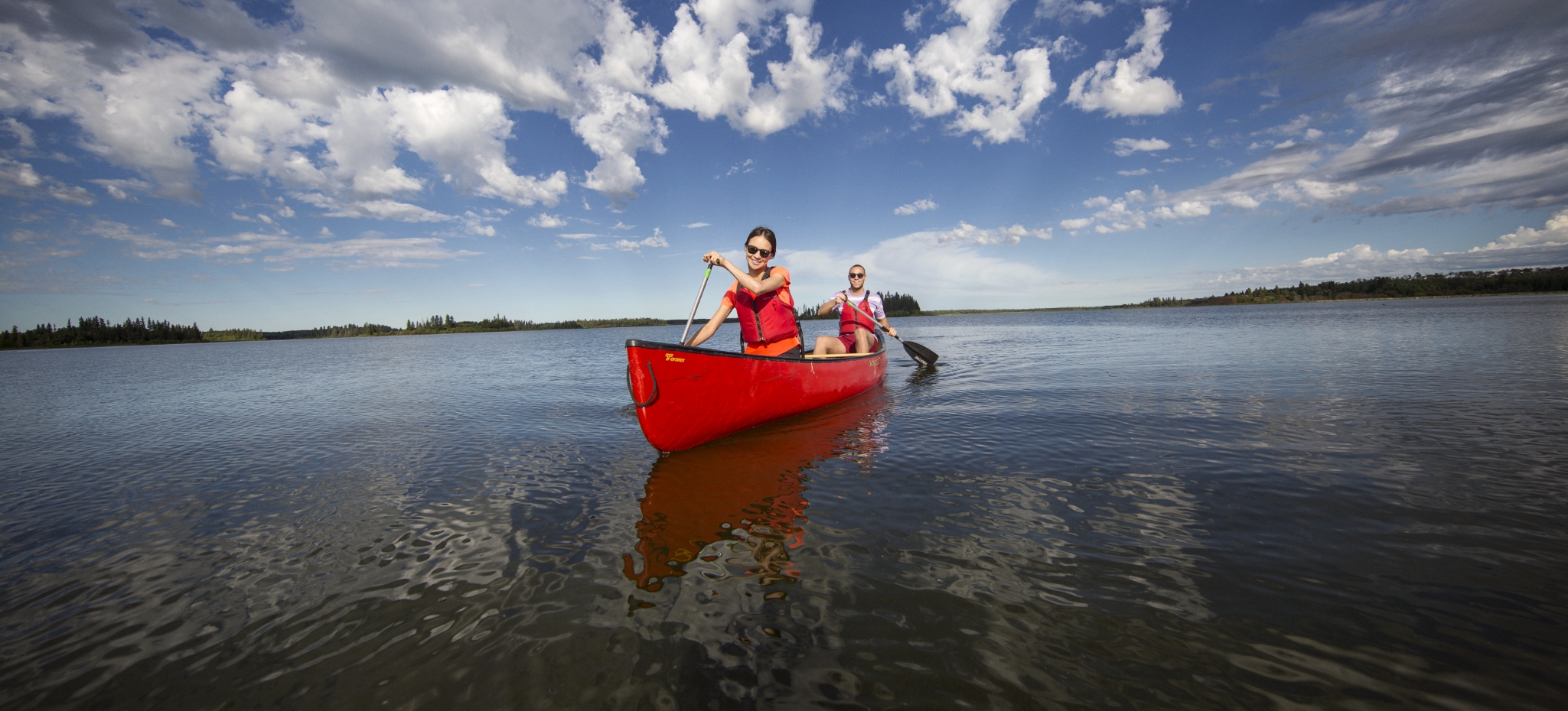 Two paddlers in a canoe.